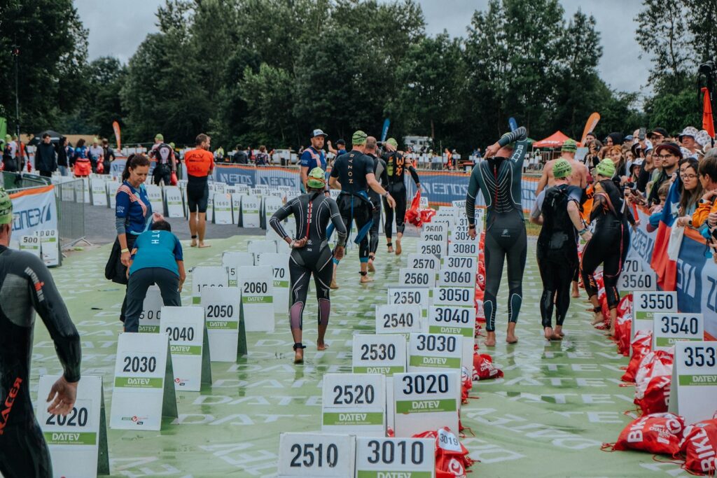 A group of people in wetsuits standing in the water unexpected challenges