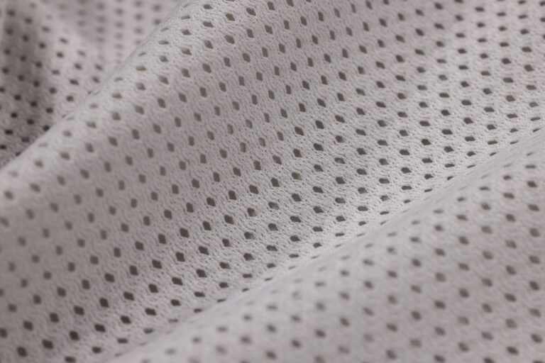 Close-up of a technical athletic shirt fabric weave