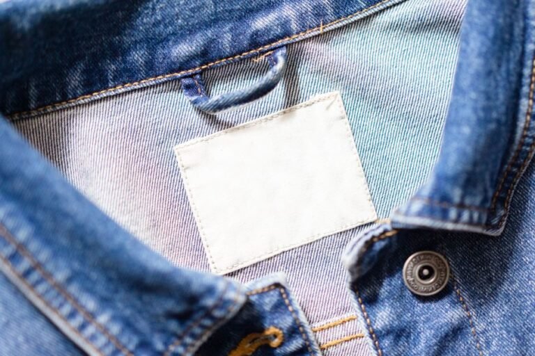 A close-up of a clothing care label showing wash instructions