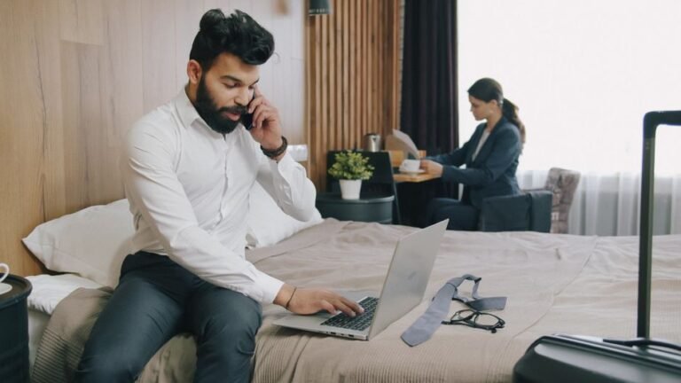 A person scrolling through hotel reviews on a smartphone